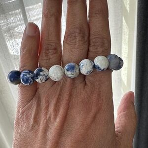 Blue and white stone beads on elastic bracelet